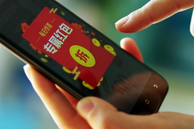 Nền tảng WeChat cung cấp tính năng lì xì trực tuyến. (Ảnh: Caixin)
