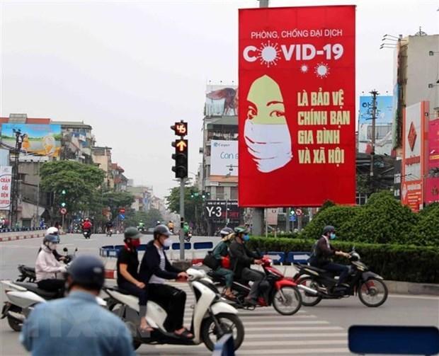 Tranh cổ động tuyên truyền về COVID-19 được đặt ở các điểm nút Đăng Ký M.PG88 của Hà Nội.