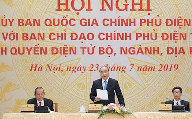 Thủ tướng Nguyễn Xuân Phúc và các Phó Thủ tướng Trương Hòa Bình, Vũ Đức Đam tại Hội nghị trực tuyến Ủy ban quốc gia về Chính phủ Xổ Số PG 88.