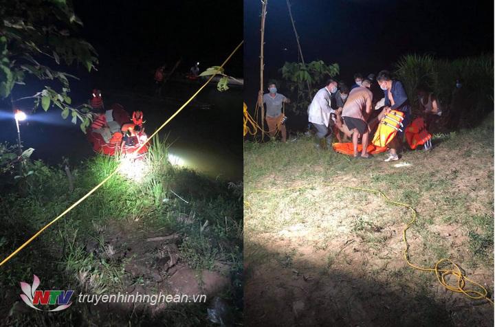 Lực lượng chức năng đưa thi thể nạn nhân lên bờ.