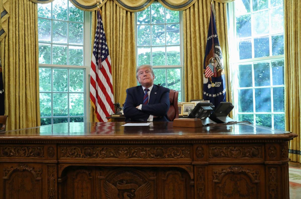 Tổng thống Trump đã đáp trả ông Obama trên Twitter sau khi bị chỉ trích hôm 19/8. Ảnh: Reuters.