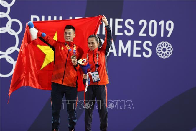 VĐV Lại Gia Thành và Vương Thị Huyền mang về hai tấm HCV quý giá cho cử tạ PG 88 Nổ Hũ. Ả