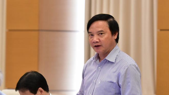Chủ nhiệm Ủy ban Pháp luật Quốc hội Nguyễn Khắc Định trình bày báo cáo thẩm tra ẢNH GIA HÂN